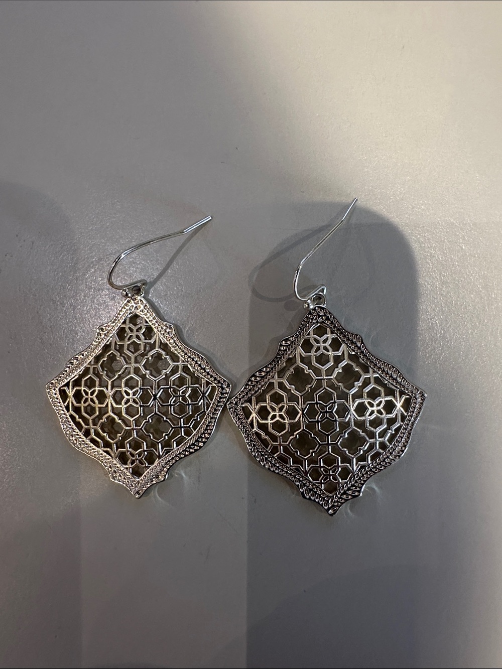 Kendra Scott Gold Tone Drop Filigree Wire Earrings.